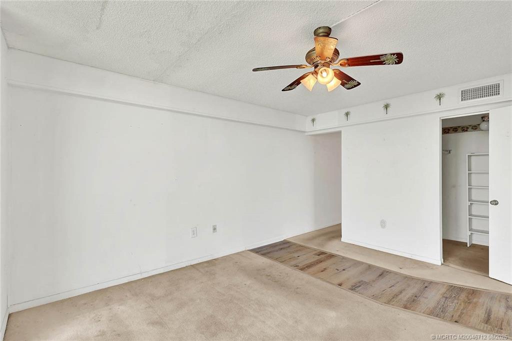 10600 South Ocean Drive, Unit 201 Jensen Beach, FL 34957 - Photo 25 of 40 a view of a chandelier fan in a room