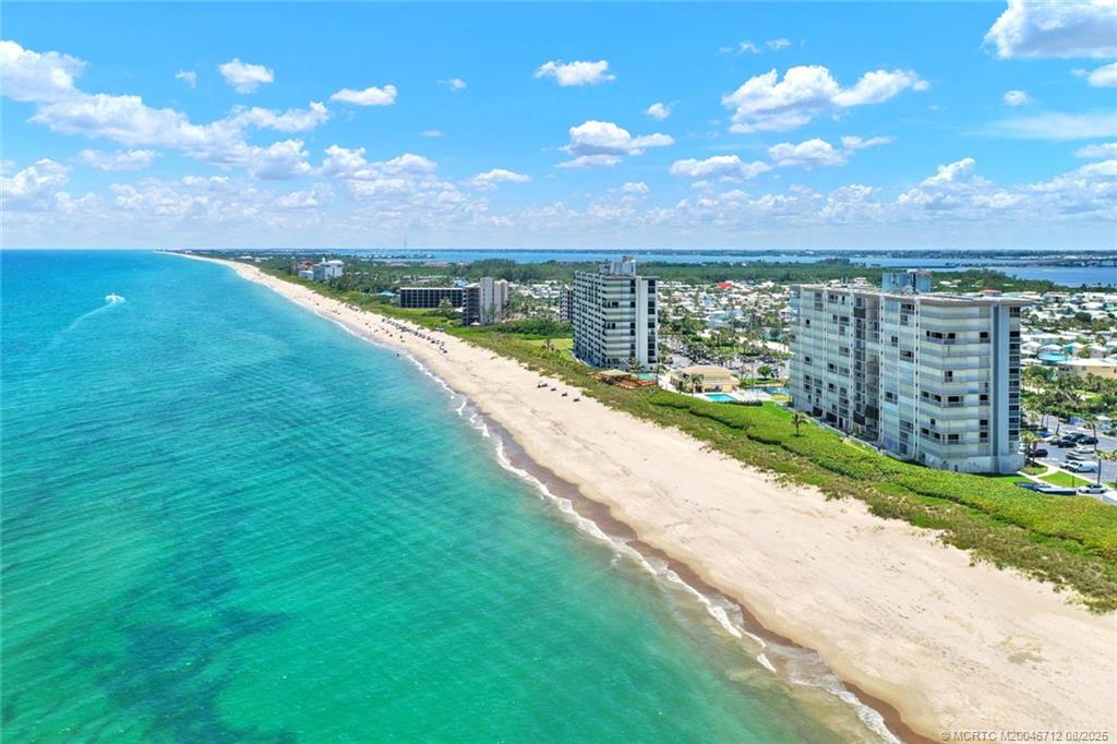 10600 South Ocean Drive, Unit 201 Jensen Beach, FL 34957 - Photo 35 of 40 a view of a lake with a big yard