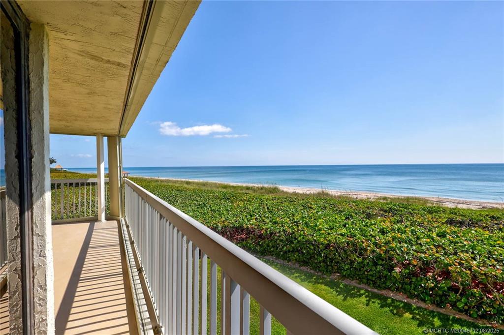 10600 South Ocean Drive, Unit 201 Jensen Beach, FL 34957 - Photo 4 of 40 a view of balcony with yard and ocean view