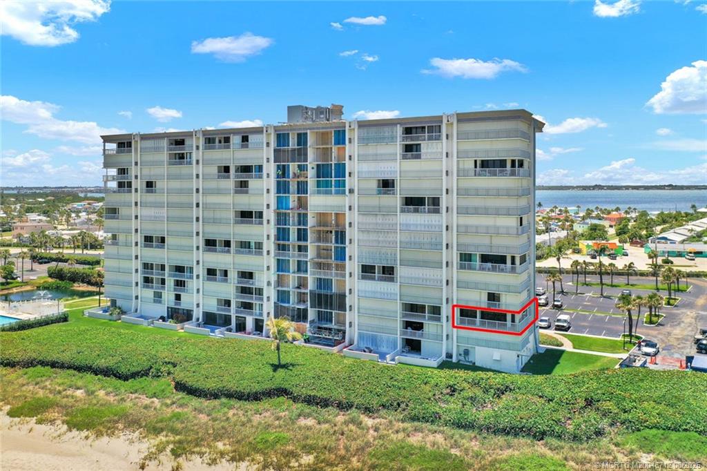 10600 South Ocean Drive, Unit 201 Jensen Beach, FL 34957 - Photo 9 of 40 a view of building with outdoor space