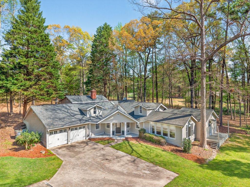 627 Rock Springs Road Lawrenceville, GA 30043 - Photo 75 of 85 an aerial view of a house with a big yard