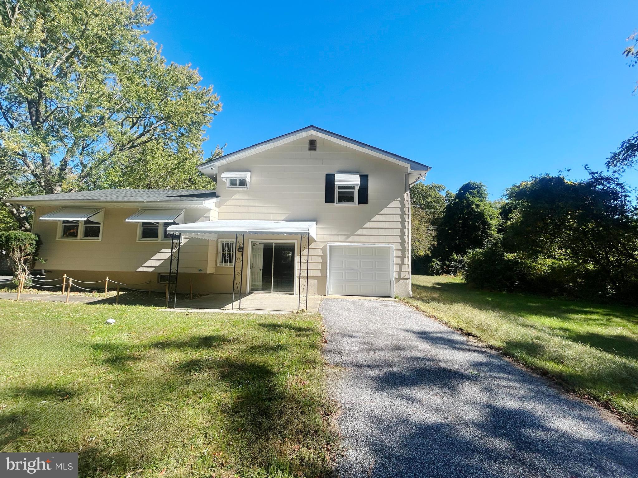 741 North Tuckahoe Road Williamstown, NJ 08094 - Photo 13 of 14 a front view of a house with yard and green space