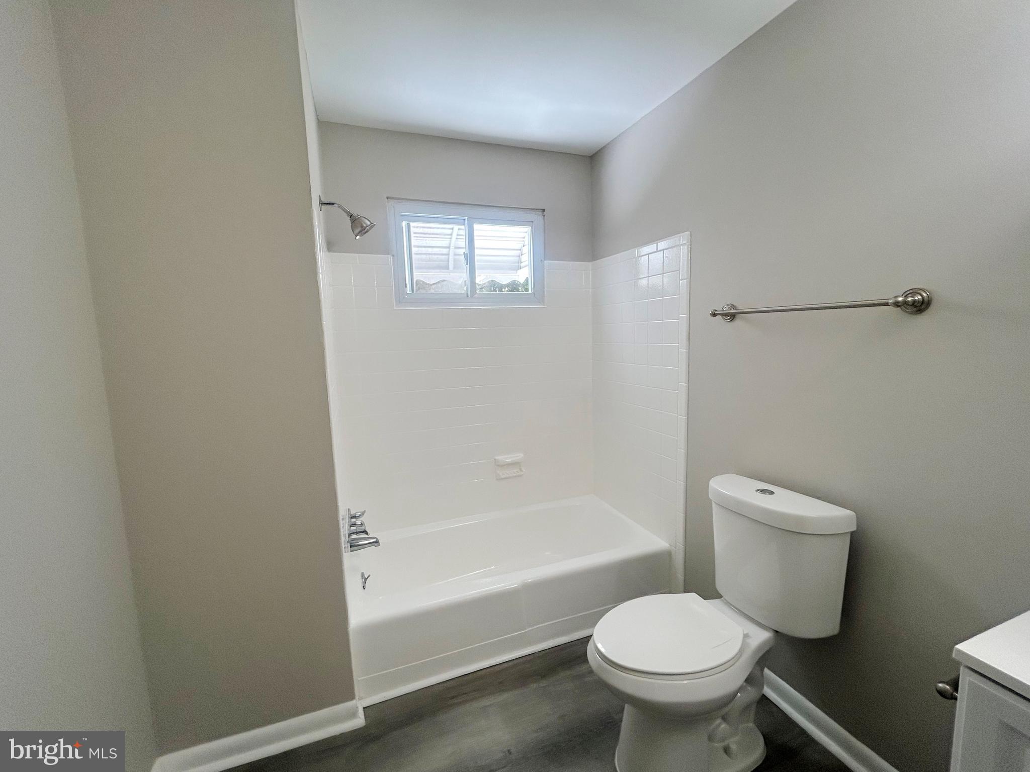 741 North Tuckahoe Road Williamstown, NJ 08094 - Photo 7 of 14 a white toilet sitting next to a bath tub