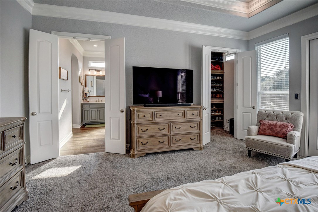 222 August Avenue Shiner, TX 77984 - Photo 22 of 48 a view of living room with furniture and flat screen tv