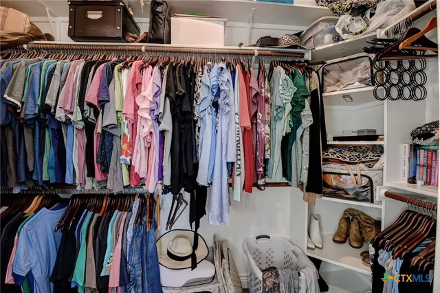 a kitchen with a stove and a refrigerator