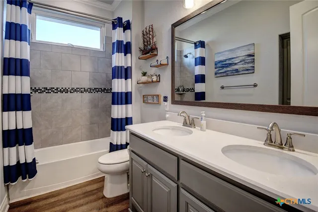 a living room with furniture and a lamp