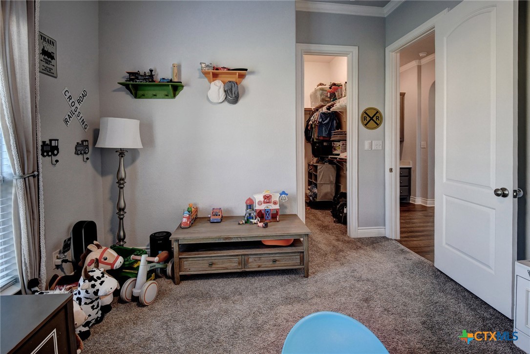 222 August Avenue Shiner, TX 77984 - Photo 33 of 48 a children room with toys