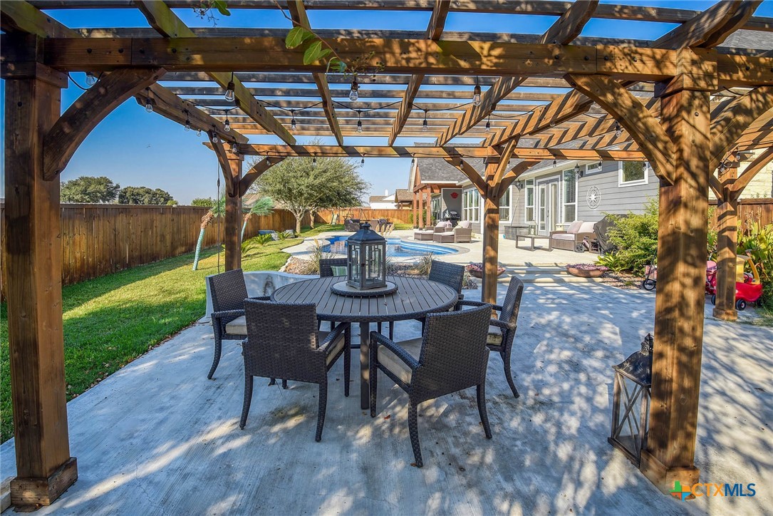 222 August Avenue Shiner, TX 77984 - Photo 46 of 48 a view of yard with patio