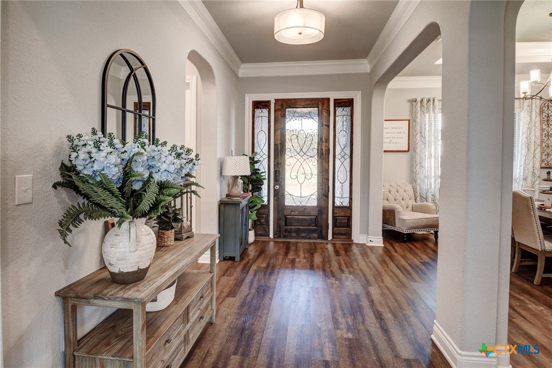 222 August Avenue Shiner, TX 77984 - Photo 6 of 48 a view of entryway with wooden floor
