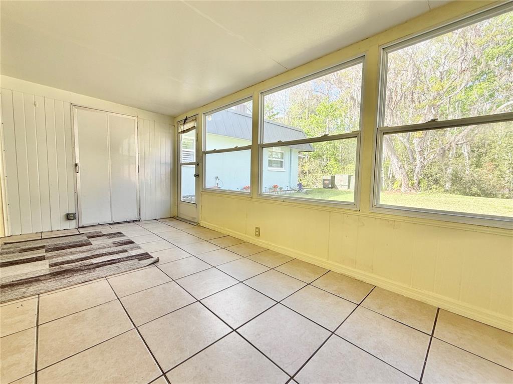 11817 Bayonet Lane New Port Richey, FL 34654 - Photo 12 of 32 a view of an empty room with a window