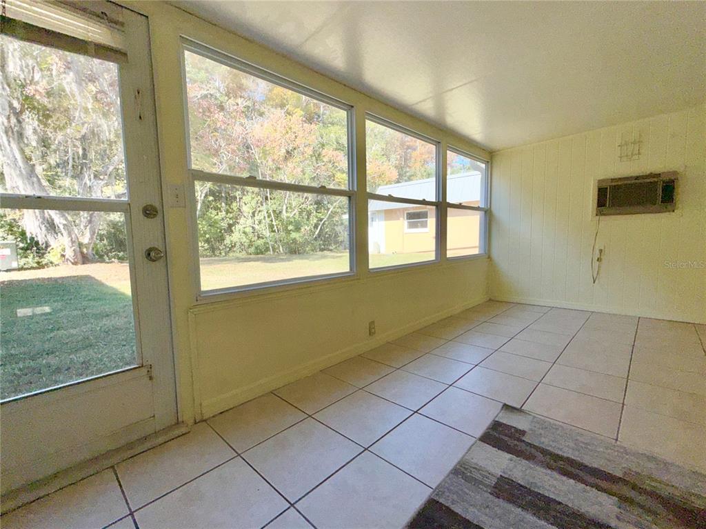 11817 Bayonet Lane New Port Richey, FL 34654 - Photo 12 of 32 a view of an empty room with a window