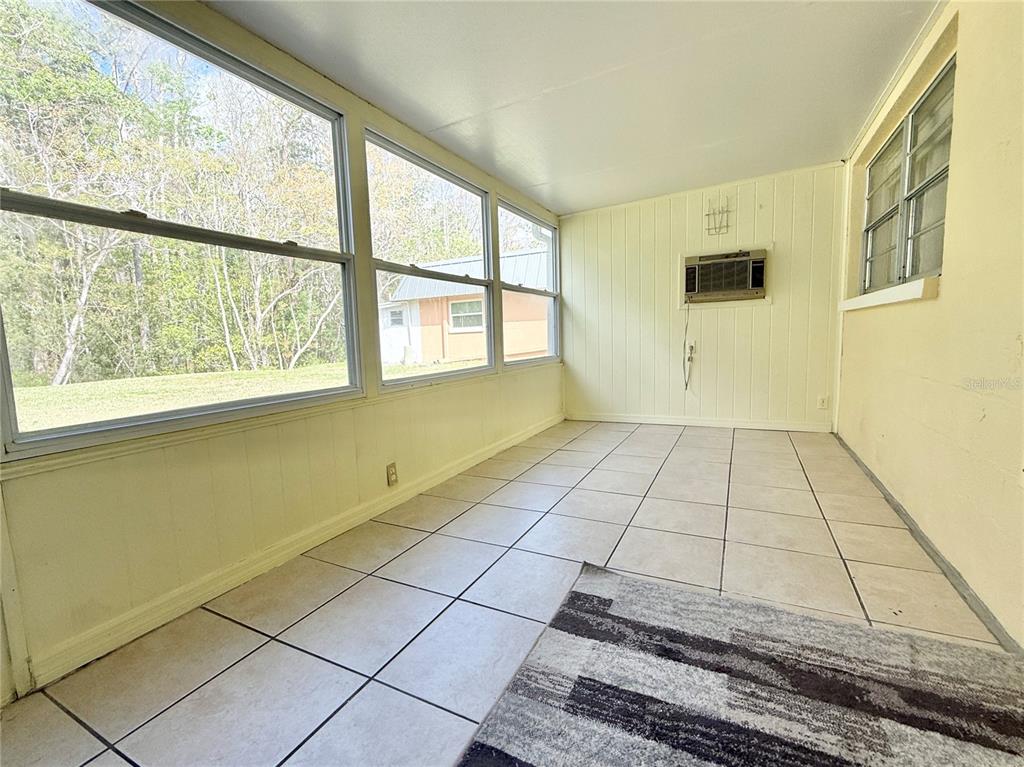11817 Bayonet Lane New Port Richey, FL 34654 - Photo 13 of 32 a view of an empty room with a window