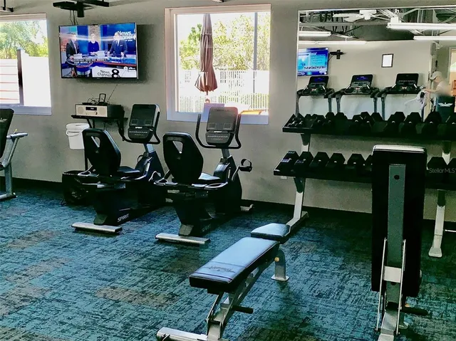 a view of a room with gym equipment
