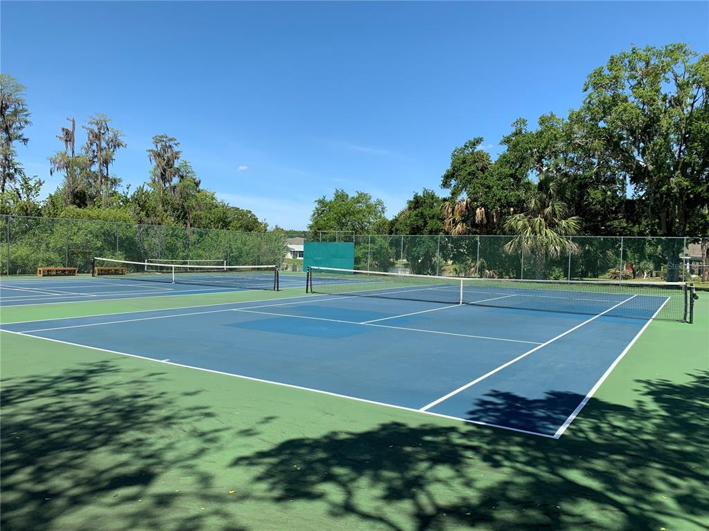 11817 Bayonet Lane New Port Richey, FL 34654 - Photo 31 of 32 a view of a tennis court