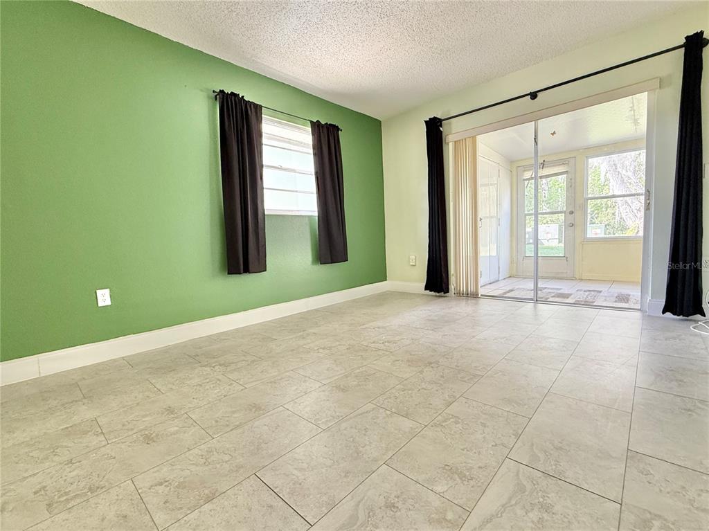 11817 Bayonet Lane New Port Richey, FL 34654 - Photo 8 of 32 a view of an empty room with a window