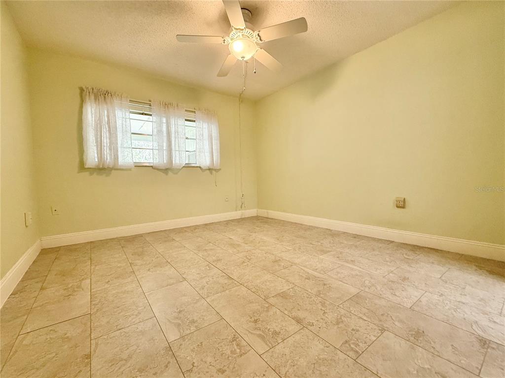 11817 Bayonet Lane New Port Richey, FL 34654 - Photo 10 of 32 a view of an empty room and window