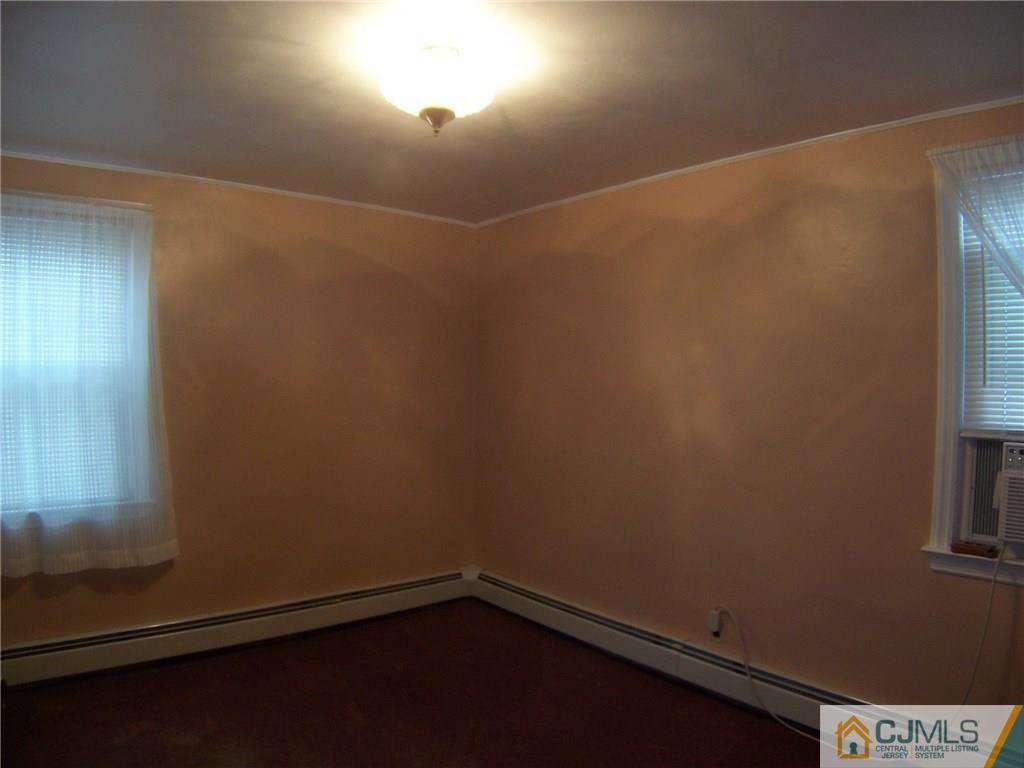 46 West Cliff Road Colonia, NJ 07067 - Photo 14 of 25 a view of a small space with wooden floor and windows