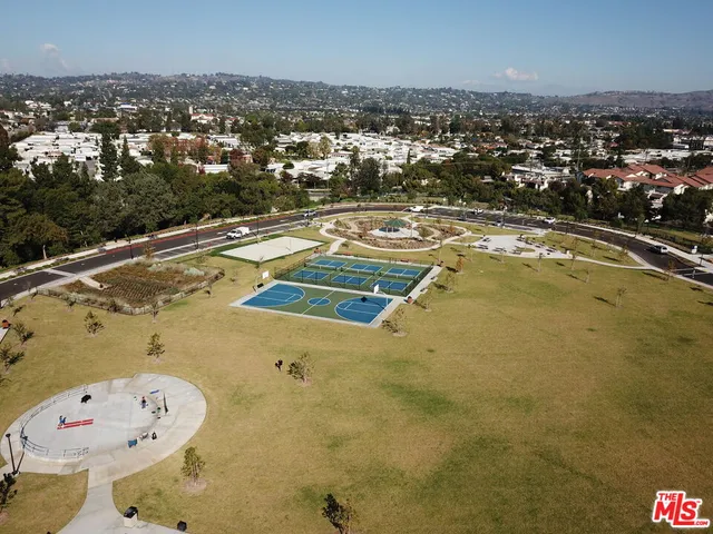 an aerial view of a house with a ocean view