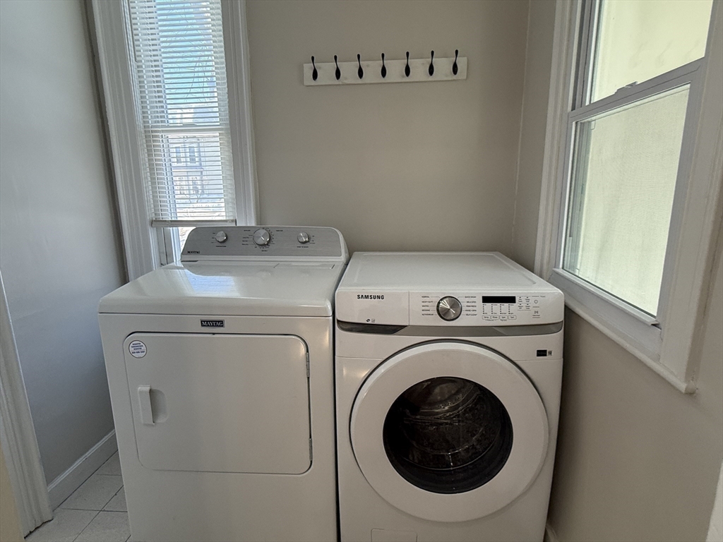 6 Channing Street, Unit 1 Newton, MA 02458 - Photo 16 of 16 a utility room with dryer and washer