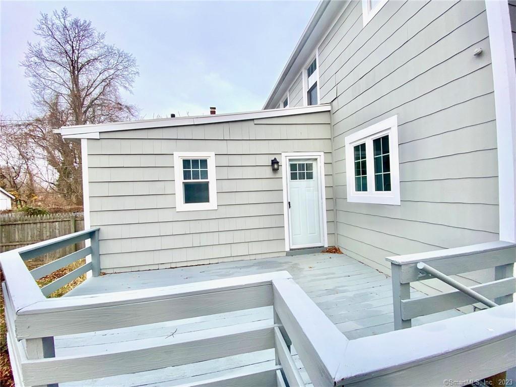 218 Ruane Street Fairfield, CT 06824 - Photo 3 of 26 a view of house with outdoor space