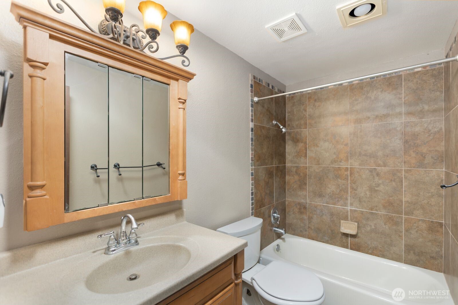 21627 9th Place West Bothell, WA 98021 - Photo 19 of 40 a bathroom with a sink mirror toilet and bathtub