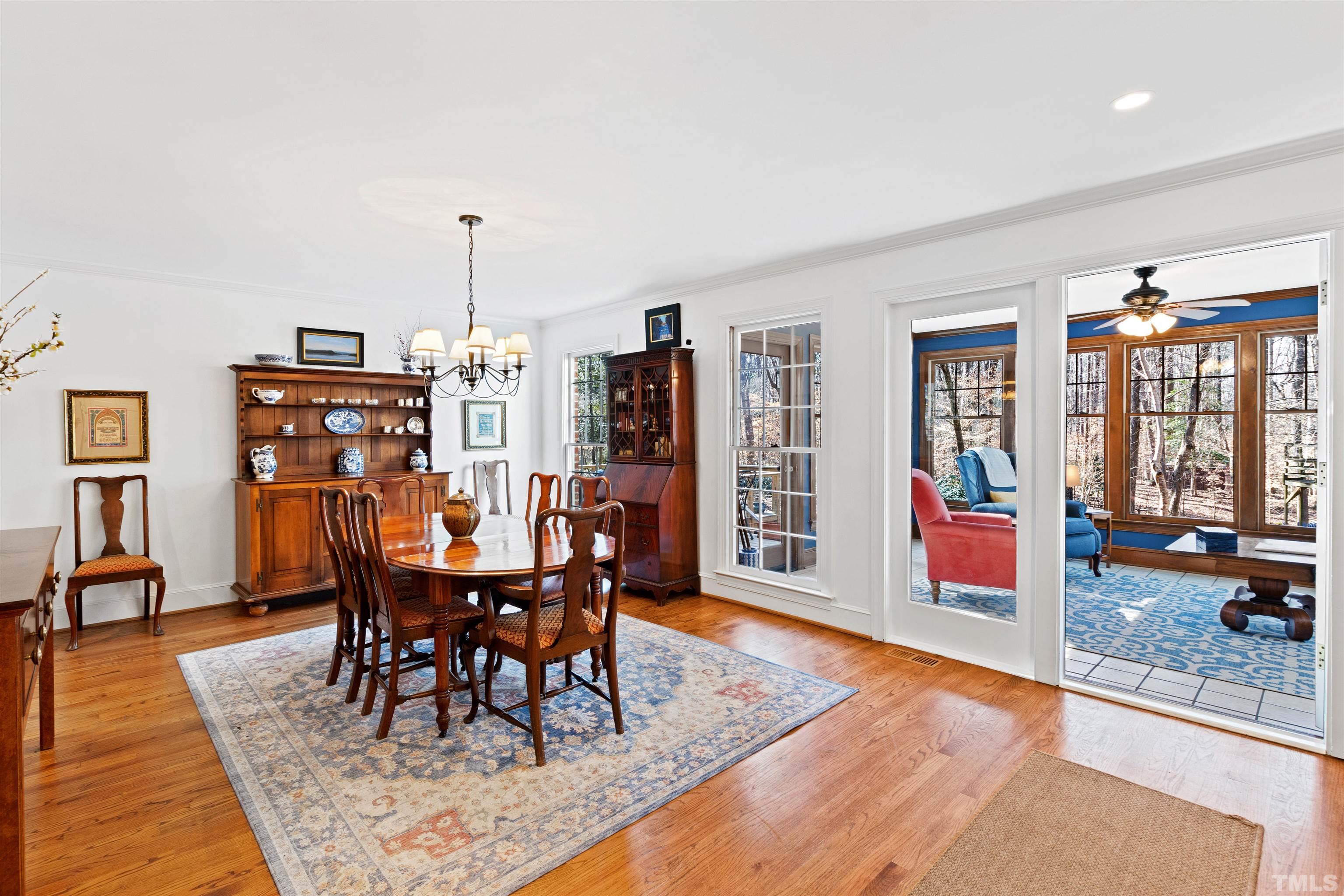 9429 Barton Creek Road Raleigh, NC 27615 - Photo 23 of 78 a view of a dining room with furniture and window