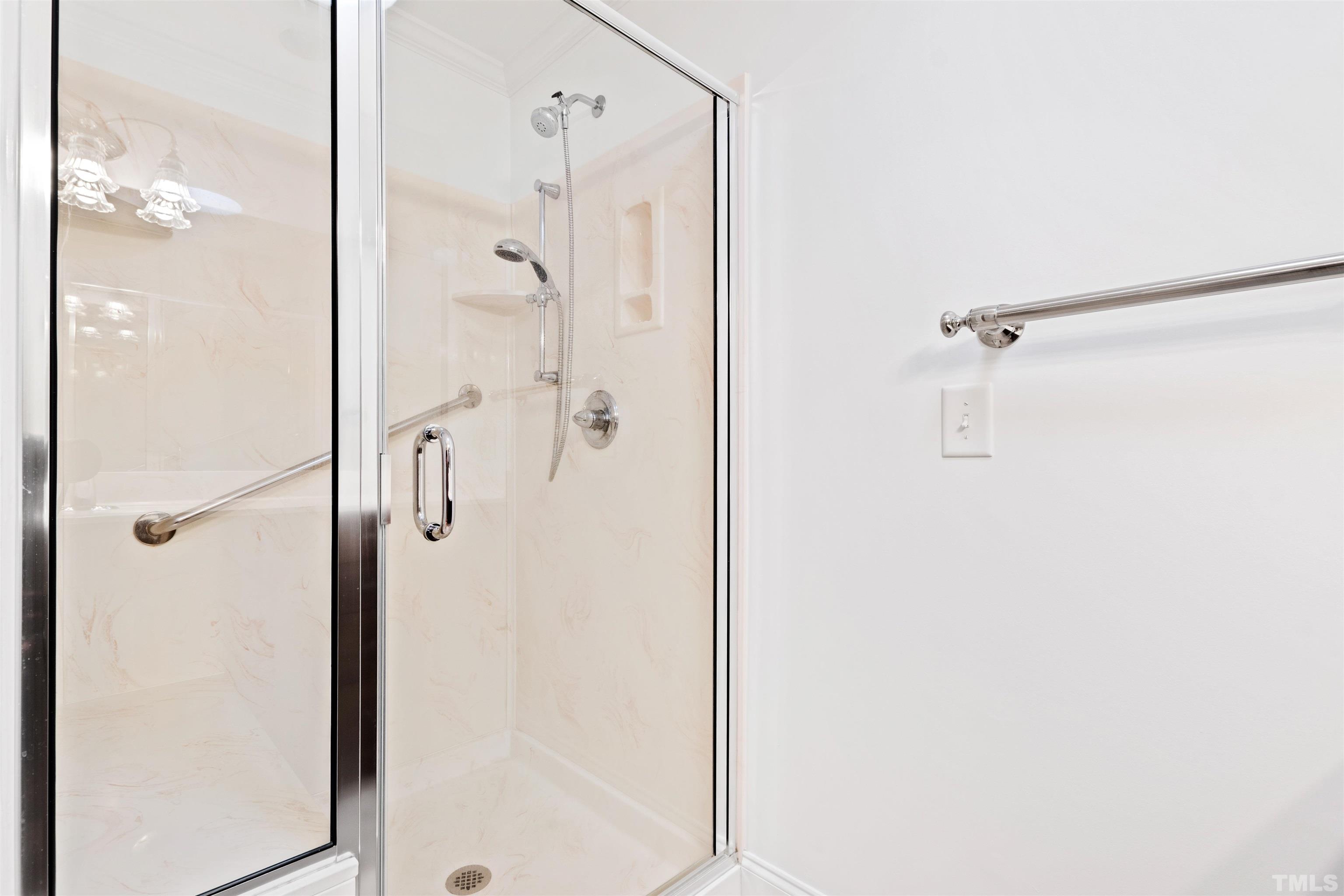 9429 Barton Creek Road Raleigh, NC 27615 - Photo 46 of 78 a bathroom with a shower