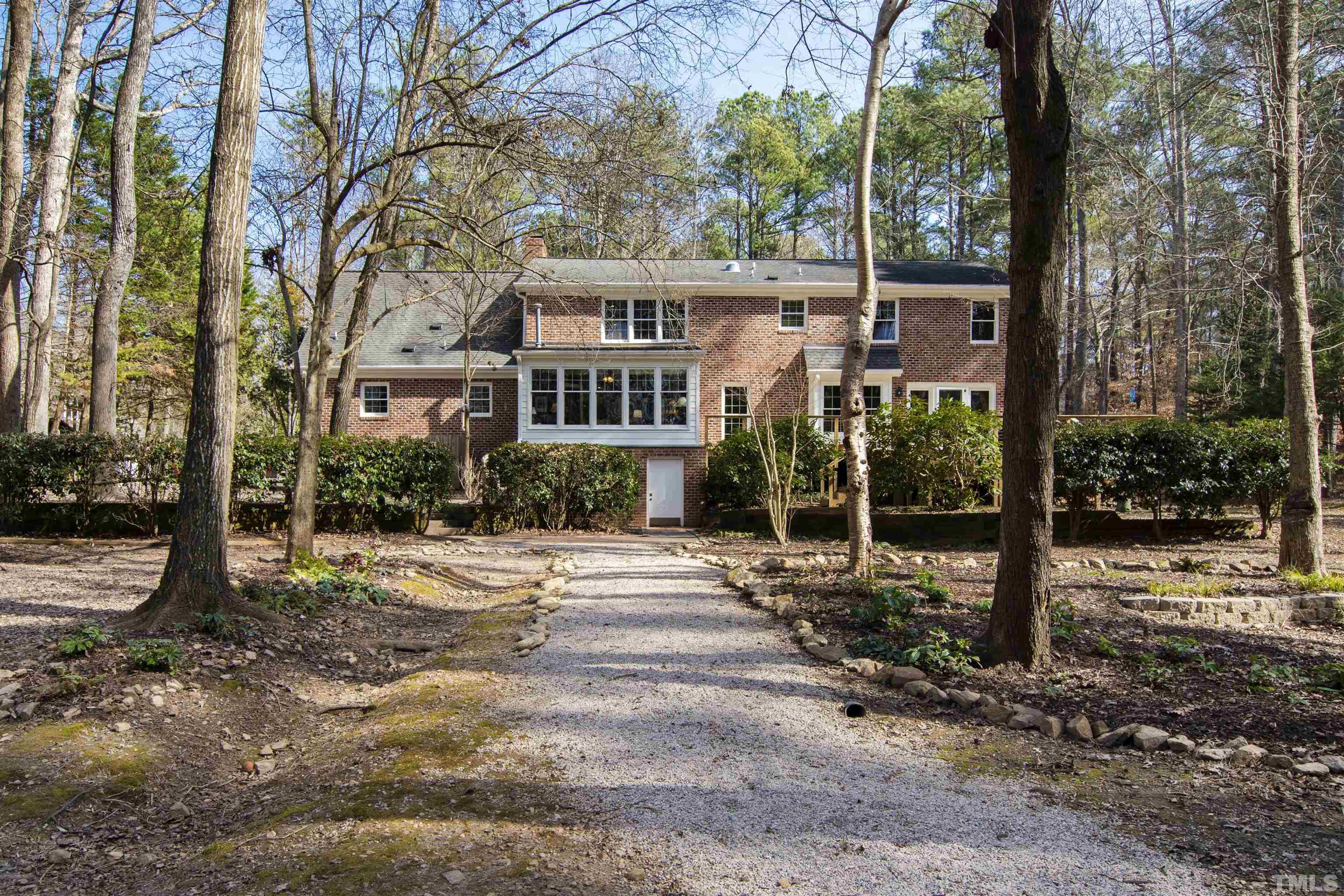 9429 Barton Creek Road Raleigh, NC 27615 - Photo 54 of 78 a front view of a house with street view