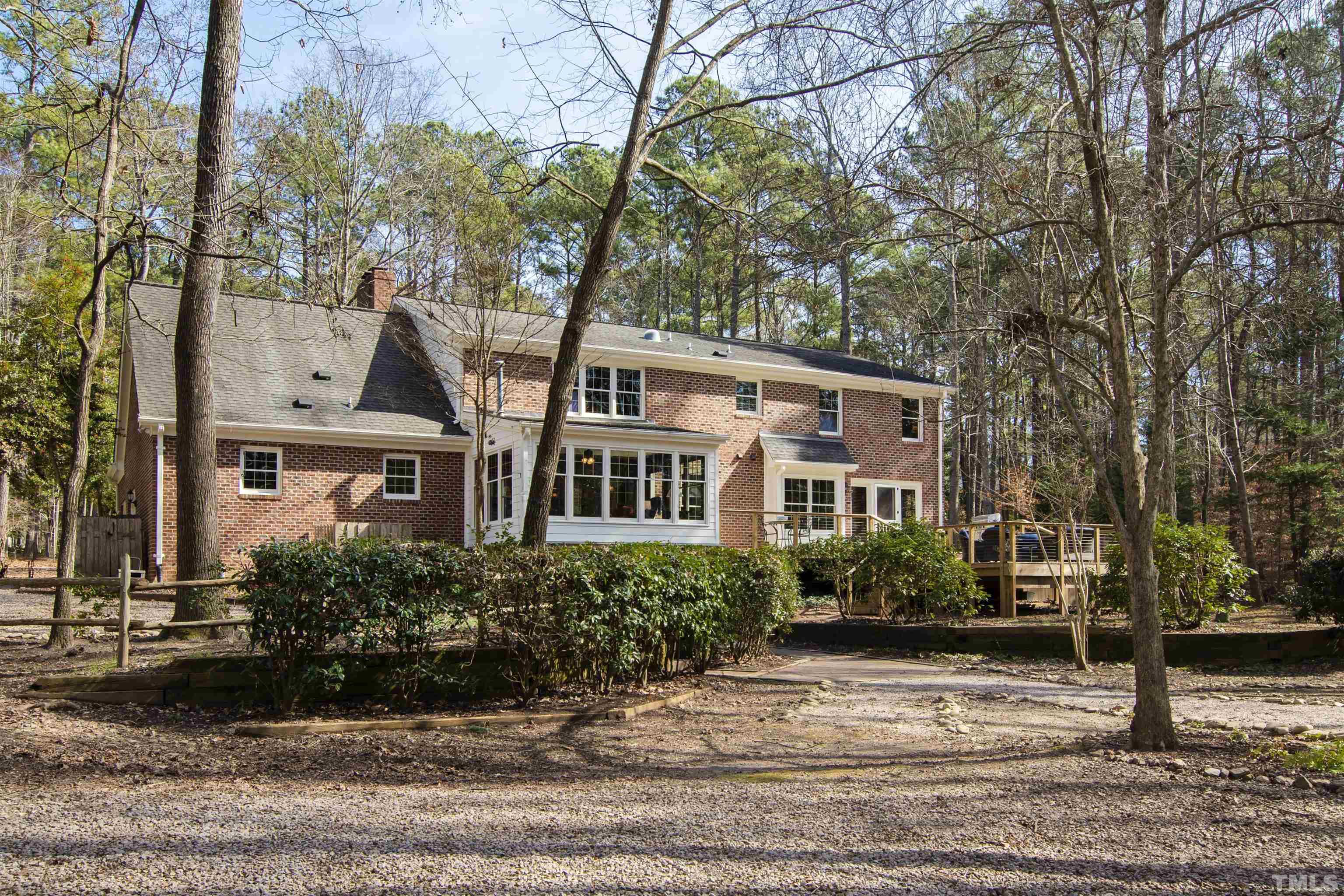 9429 Barton Creek Road Raleigh, NC 27615 - Photo 56 of 78 a front view of a house with a yard
