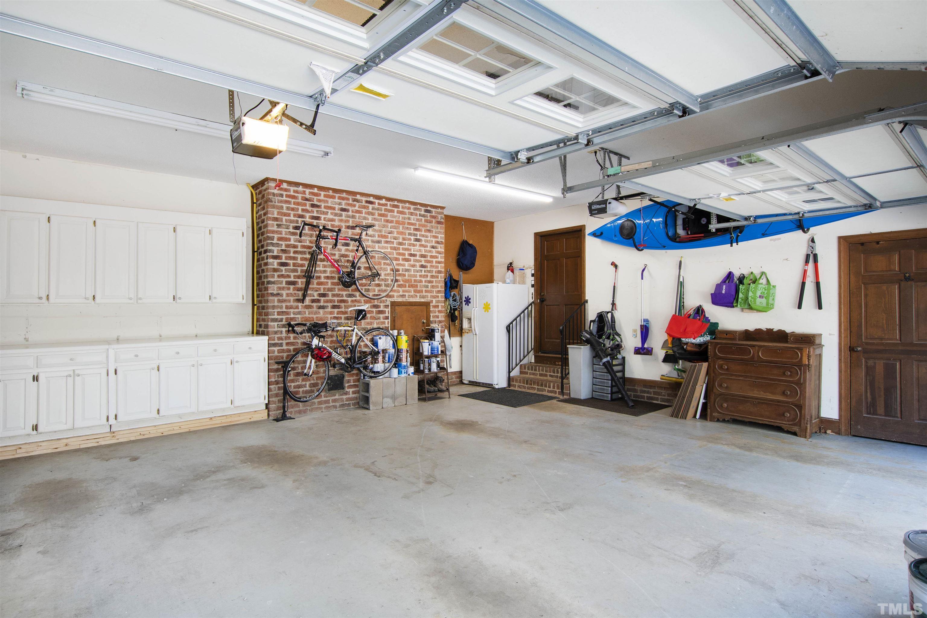 9429 Barton Creek Road Raleigh, NC 27615 - Photo 73 of 78 a view of a garage with room
