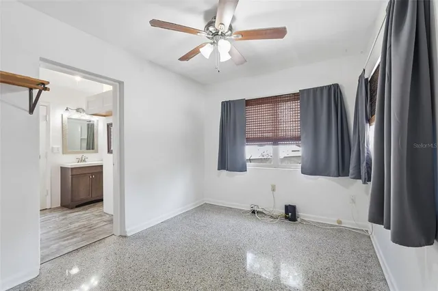 wooden floor and window in an empty room