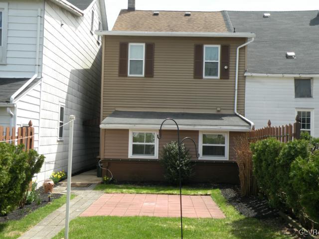 343 Broad Street Emmaus, PA 18049 - Photo 13 of 16 a front view of a house with a yard and plants