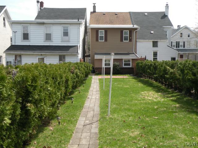 343 Broad Street Emmaus, PA 18049 - Photo 15 of 16 a front view of a house with garden