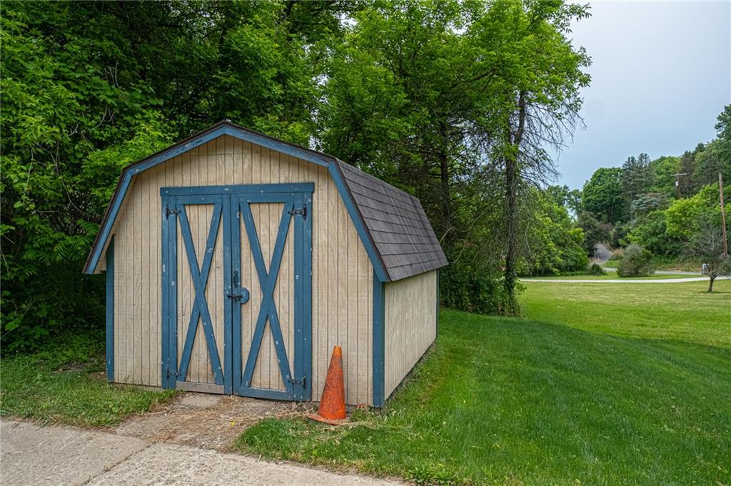 321 Logan Road Imperial, PA 15126 - Photo 24 of 24 Storage shed next to driveway.