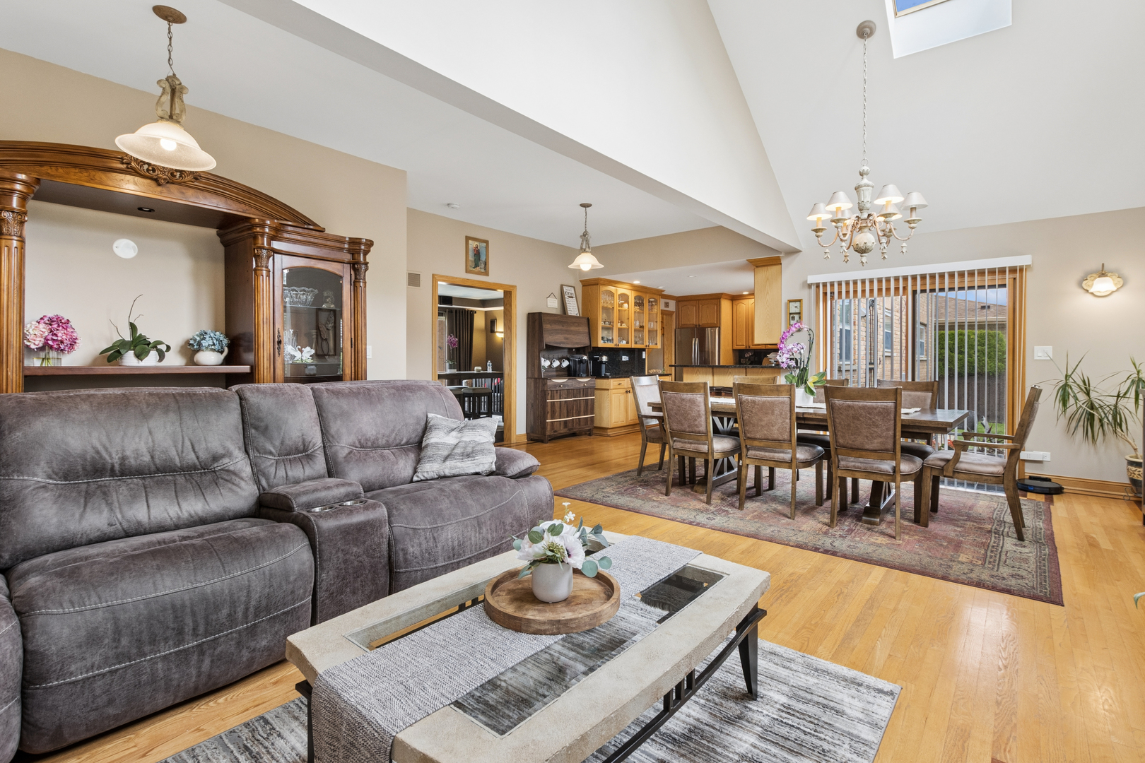 7911 West Rascher Avenue Chicago, IL 60656 - Photo 16 of 39 a living room with furniture and a chandelier