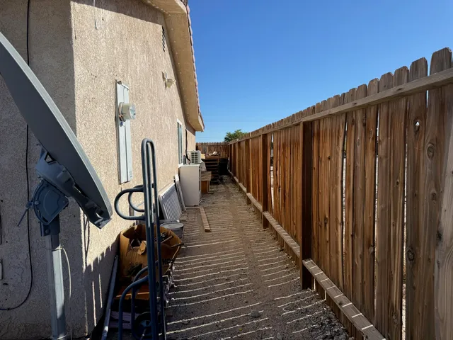 a view of a balcony with wooden floor