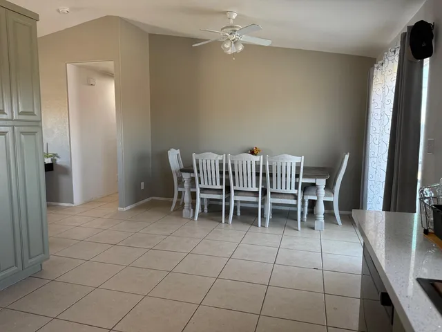 an empty room with a furniture and a window