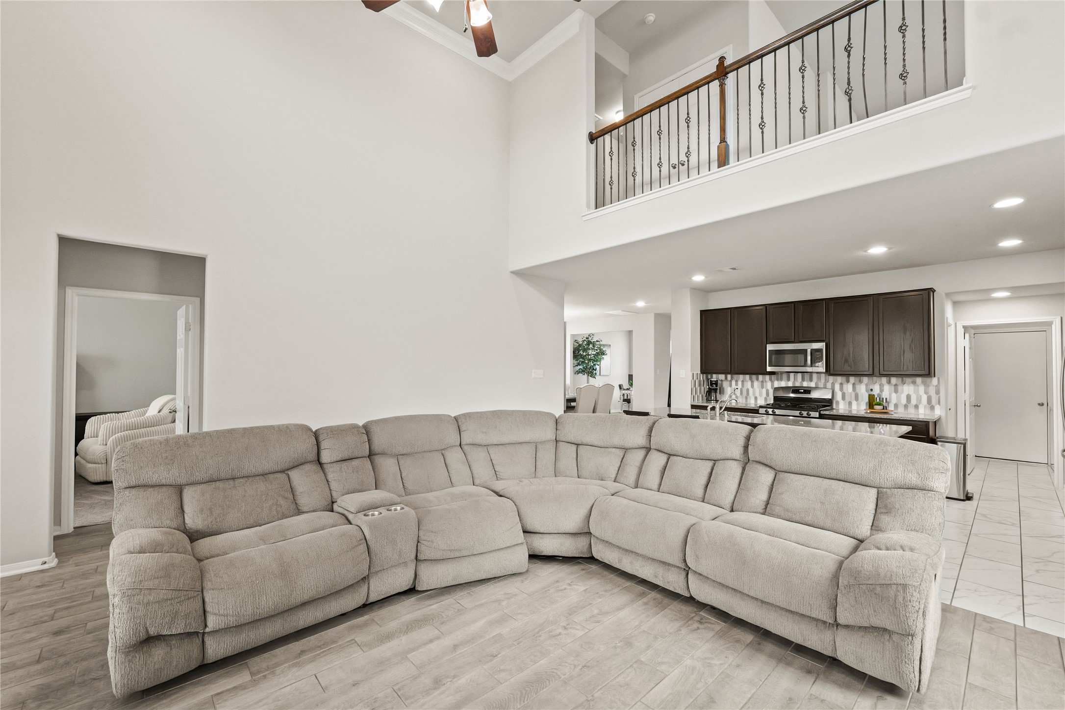 11107 Larkspur Dale Houston, TX 77044 - Photo 17 of 36 a living room with furniture and a view of bedroom
