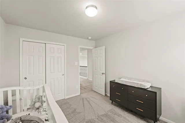 a room with a dresser and a mirror