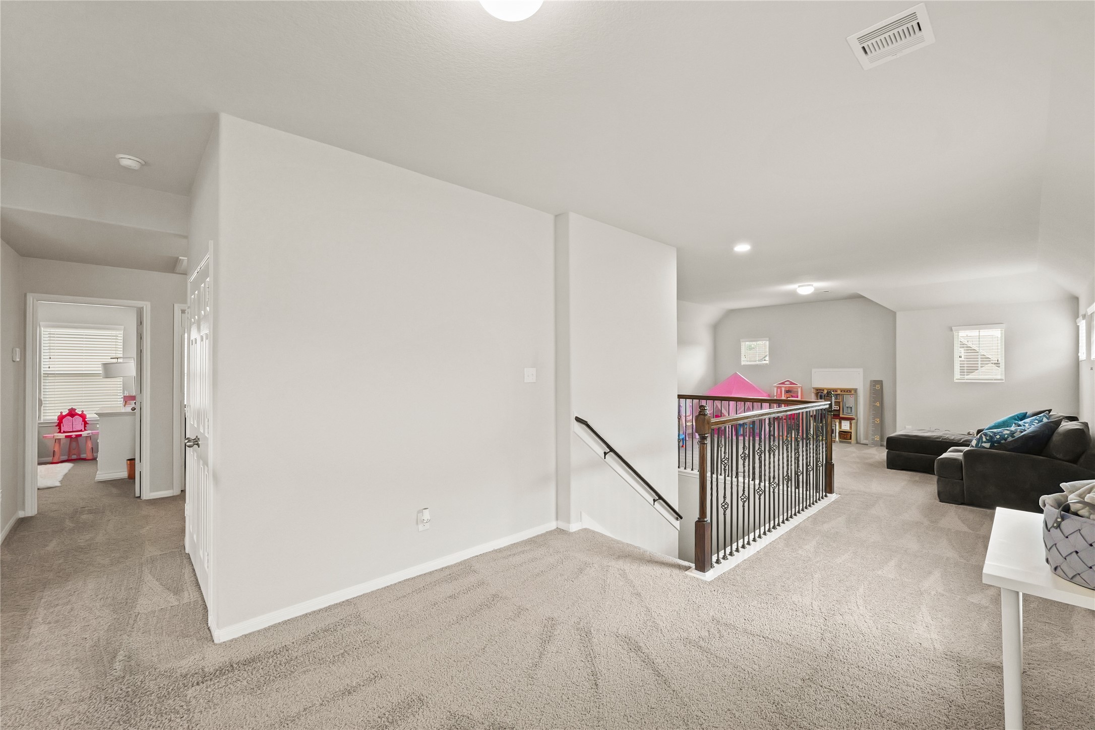 11107 Larkspur Dale Houston, TX 77044 - Photo 31 of 36 a view of a livingroom with toys