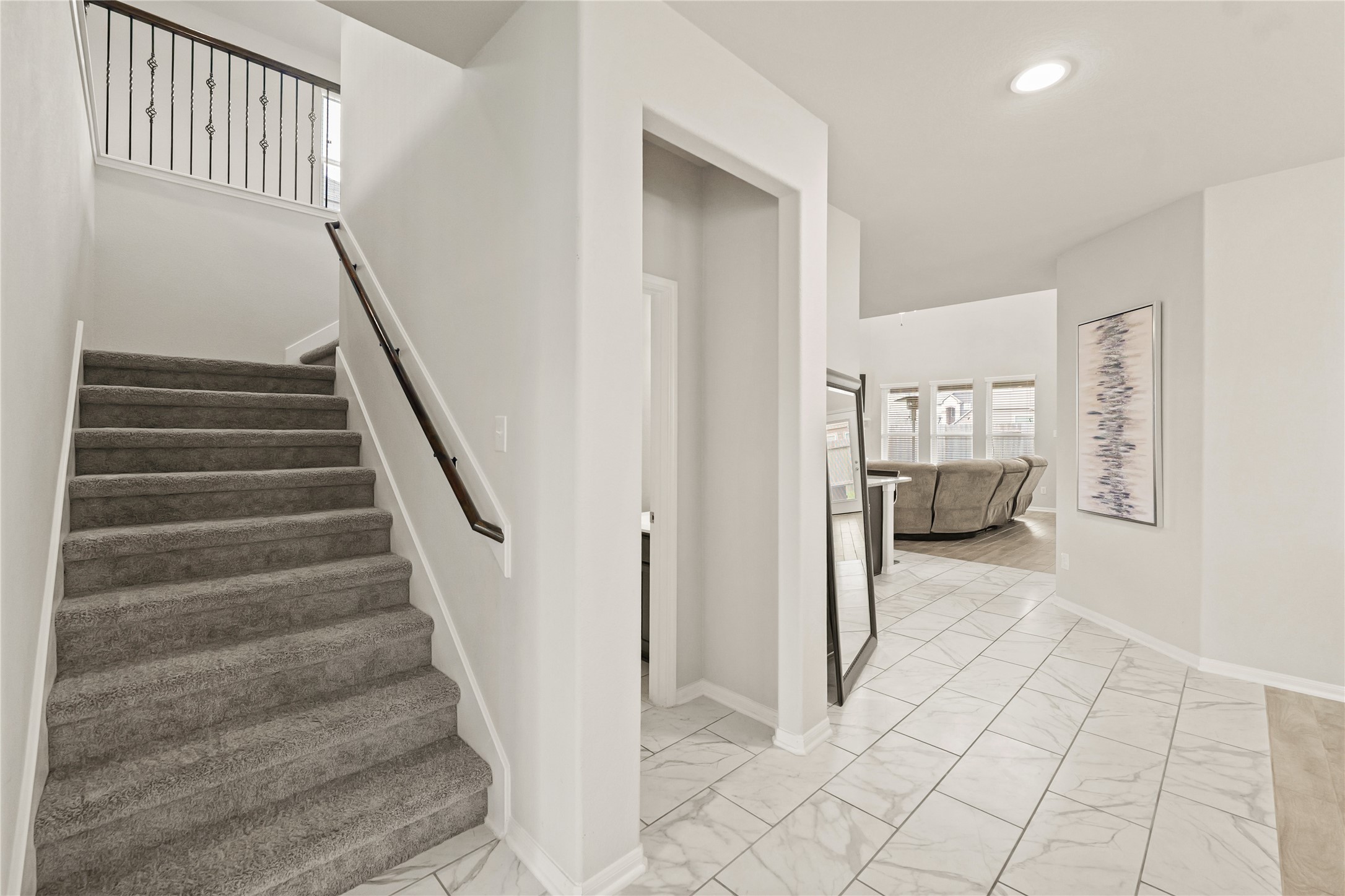 11107 Larkspur Dale Houston, TX 77044 - Photo 9 of 36 a view of entryway with bedroom and stairs