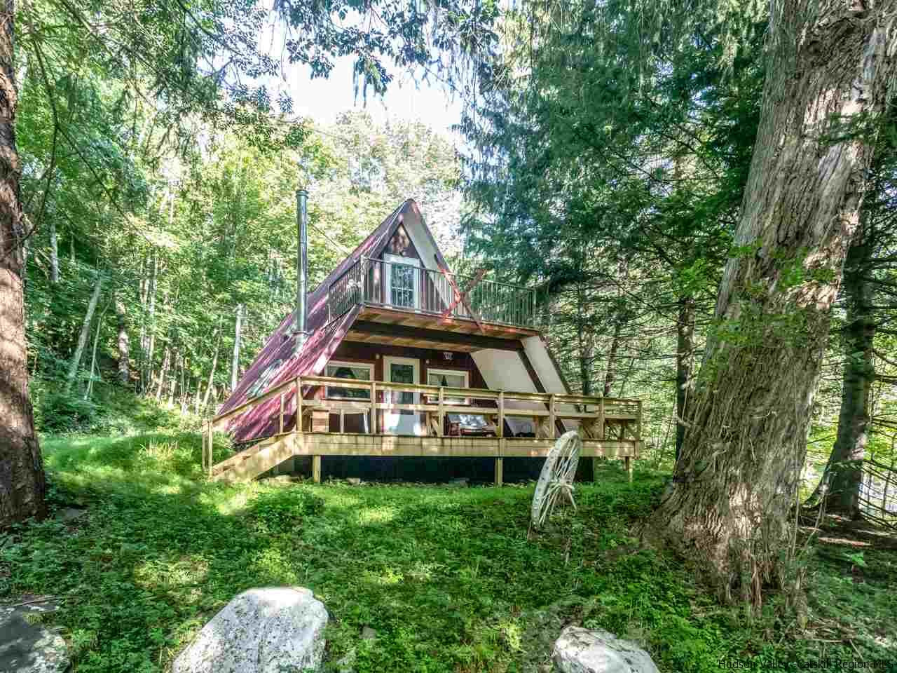 161 Pine Hill Road Shandaken, NY 12410 - Photo 1 of 19 a view of a house with a small yard