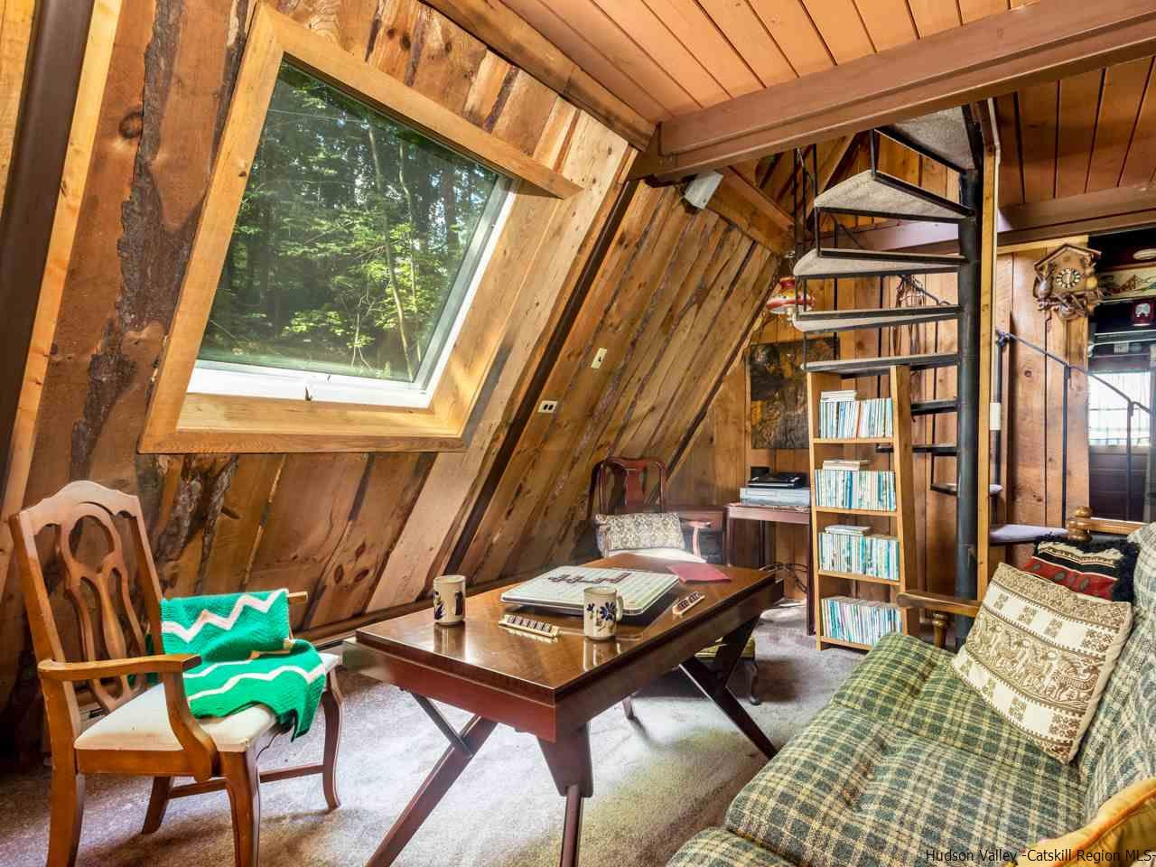 161 Pine Hill Road Shandaken, NY 12410 - Photo 5 of 19 a living room with furniture a rug and a window