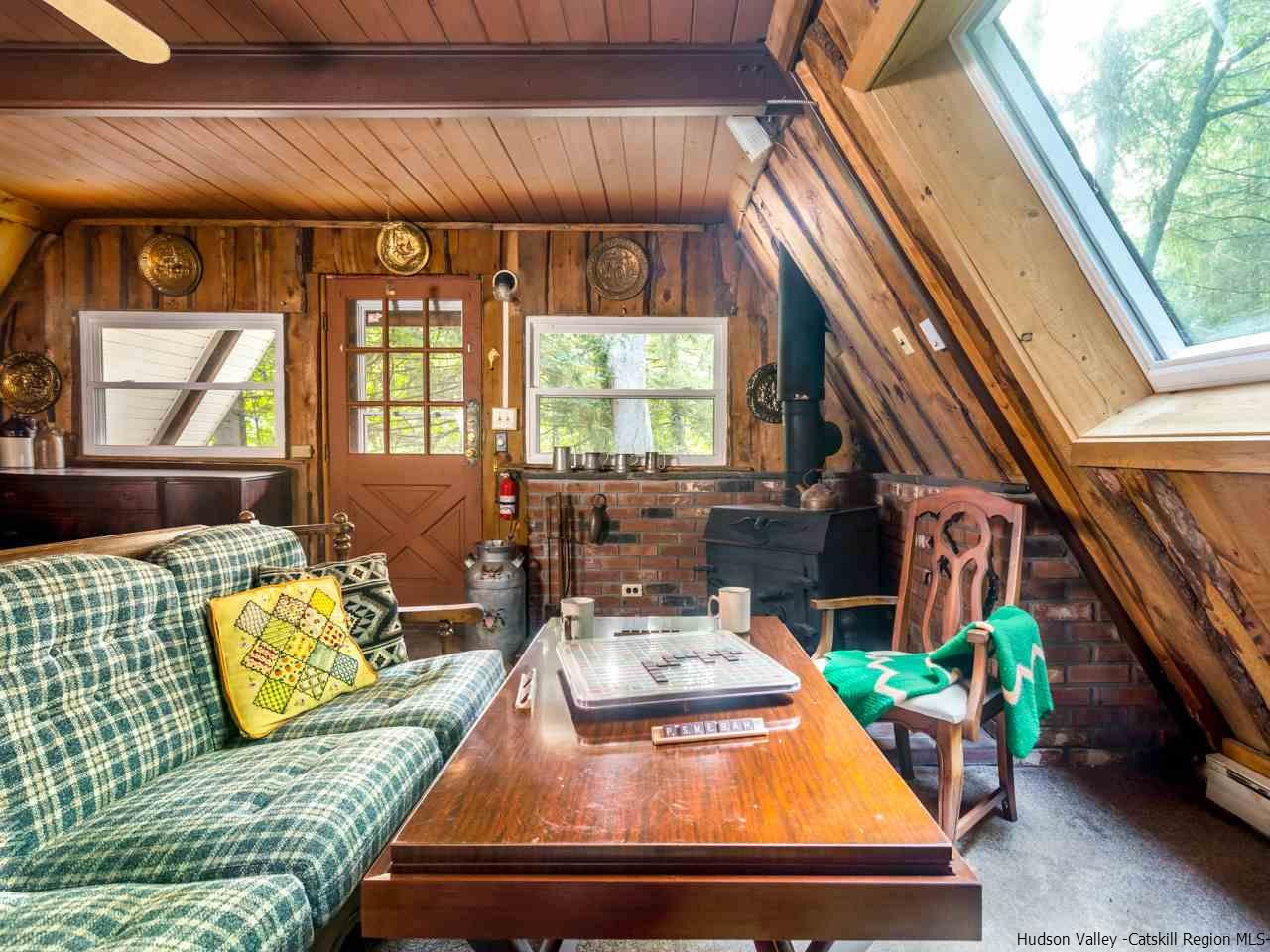 161 Pine Hill Road Shandaken, NY 12410 - Photo 6 of 19 a room with furniture and window