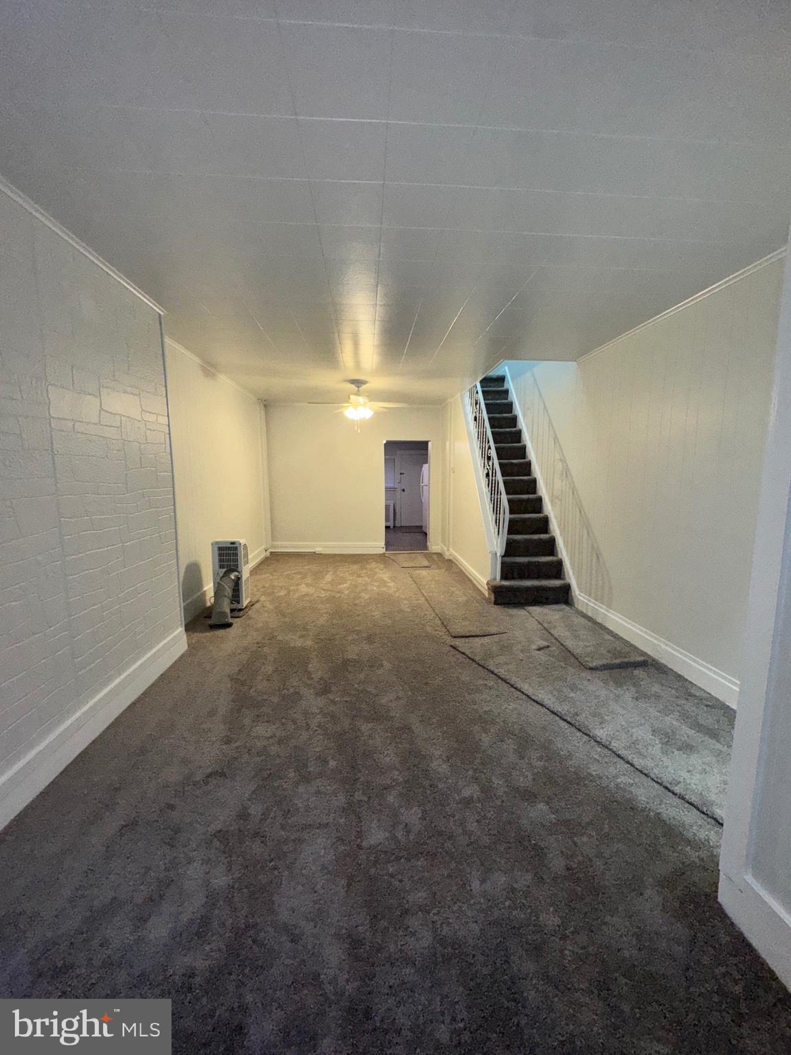 1031 Cantrell Street Philadelphia, PA 19148 - Photo 2 of 10 a view of an empty room with stairs