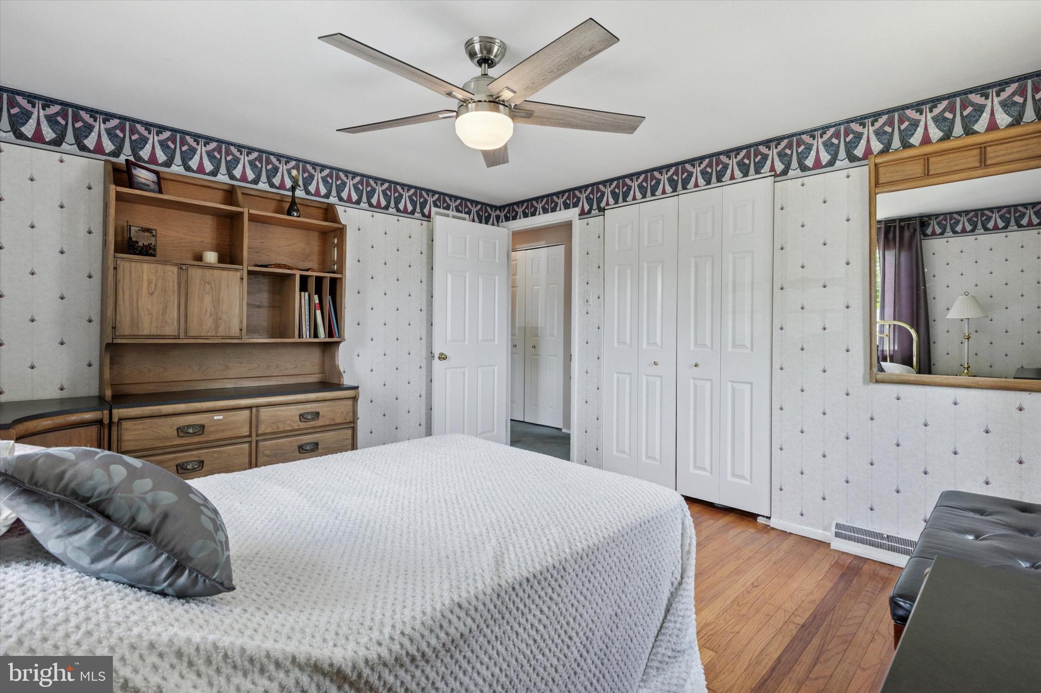 315 Waverly Road Southampton, PA 18966 - Photo 17 of 24 a bedroom with a bed and a chandelier
