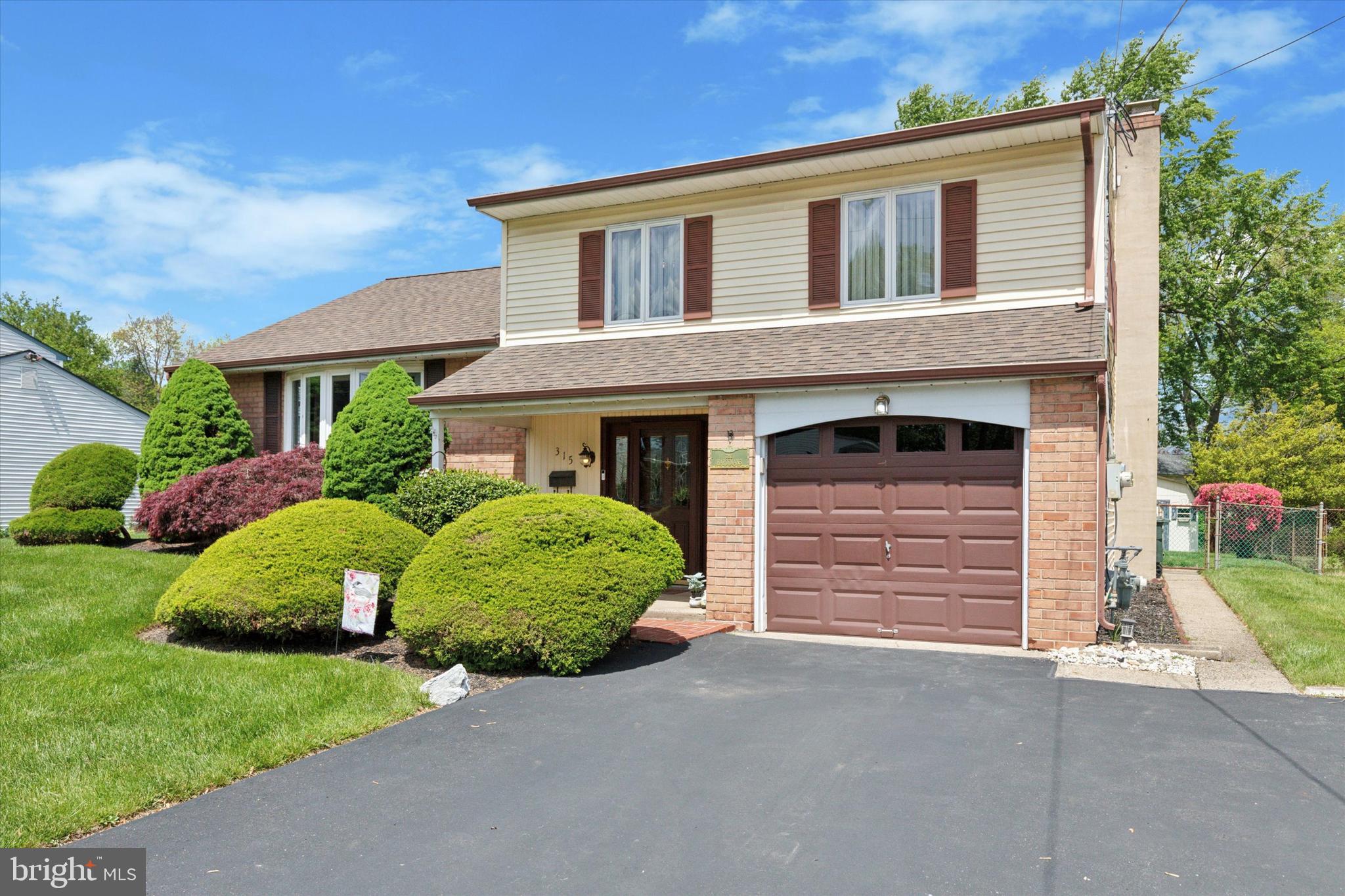 315 Waverly Road Southampton, PA 18966 - Photo 2 of 24 front view of a house with a garden