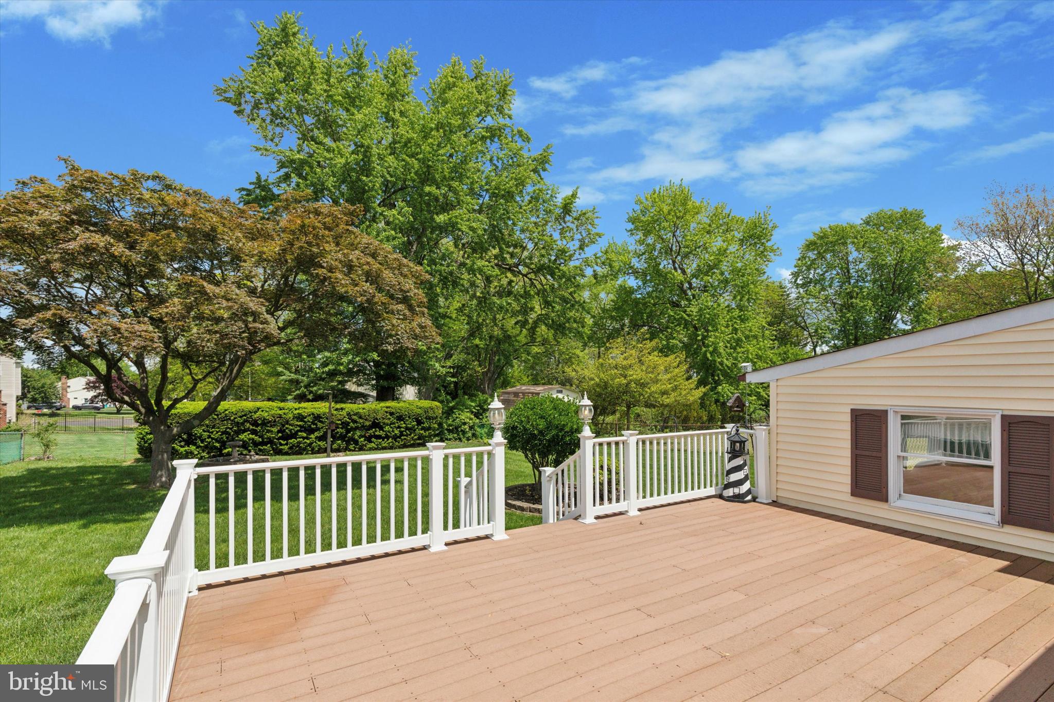 315 Waverly Road Southampton, PA 18966 - Photo 21 of 24 a view of a deck with a large window and a yard