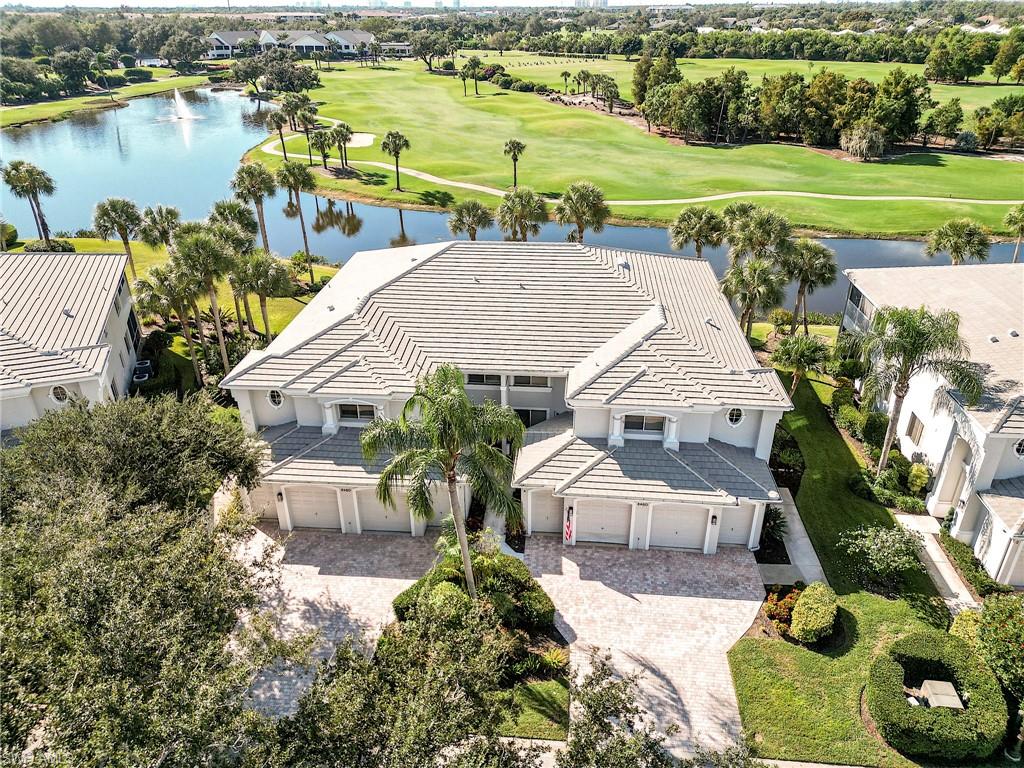 an aerial view of a house with a ocean view