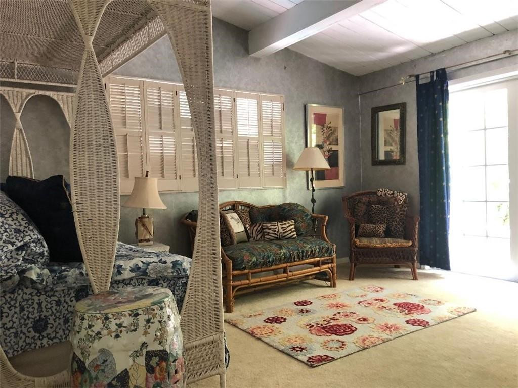 2713 Northeast 30th Avenue Lighthouse Point, FL 33064 - Photo 12 of 22 a living room with furniture and a rug